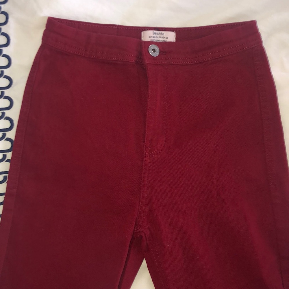 High waisted dark red flared jeans